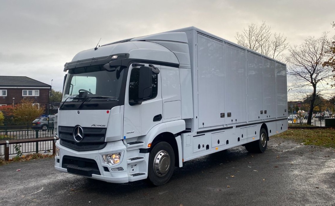 Professional white Mercedes-Benz Actros commercial truck with custom FineLine Bodies box body, showcasing quality commercial vehicle manufacturing in daylight setting